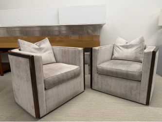 Wood Trim Accent and Cushioned Swivel Chair