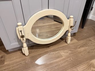Mirror with coat/hat hooks