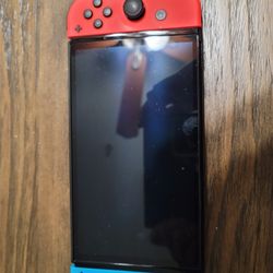 Nintendo OLED, Dock, and Games