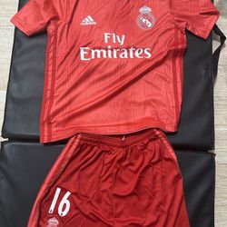 Adidas Real Madrid 18/19 Third Jersey in the "Real Coral" color with "Jacqueline" and the number "16"  Kids Size 24