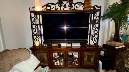 Wood and real rod iron and stone wall unit