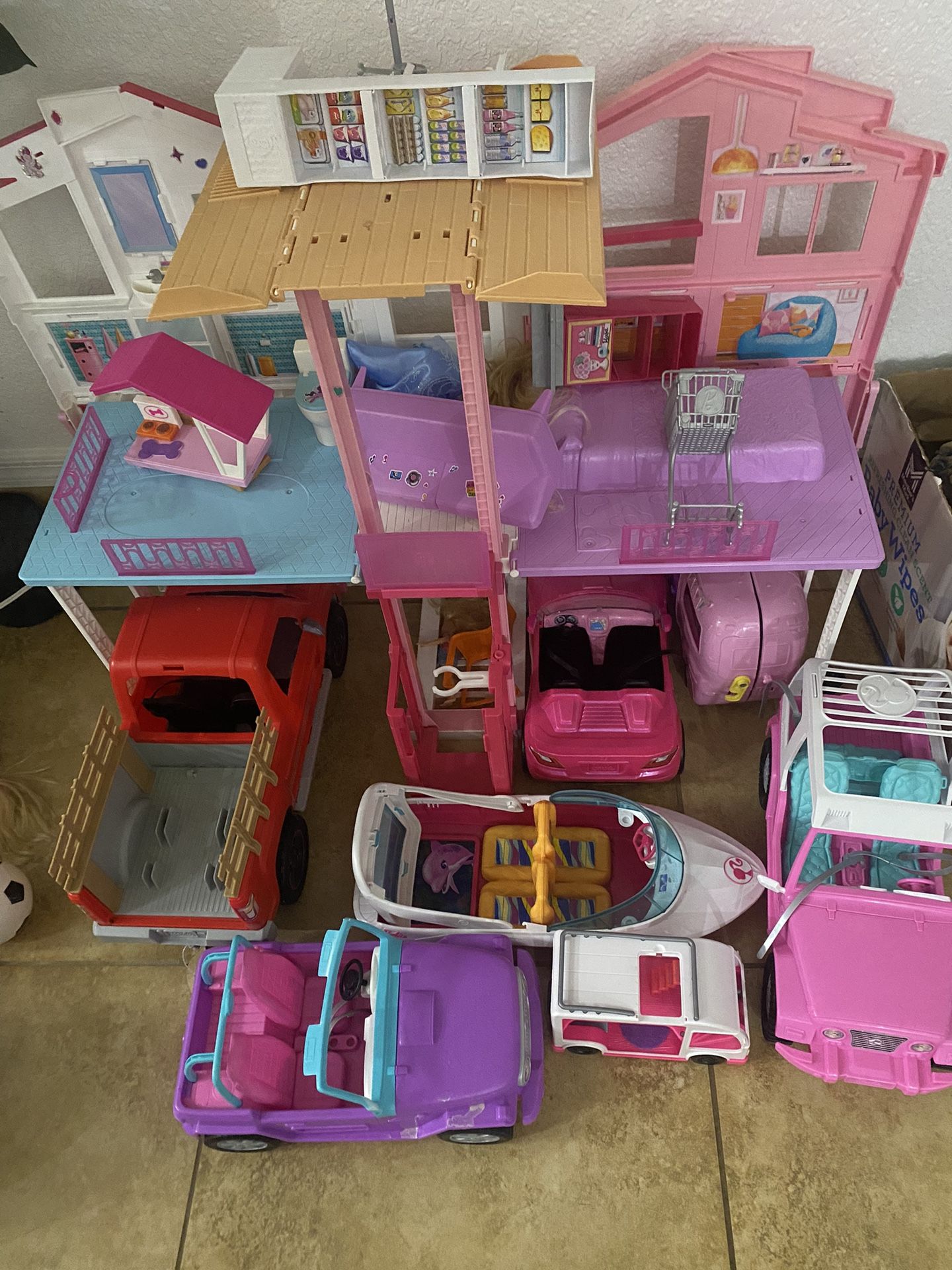 barbie doll house and cars