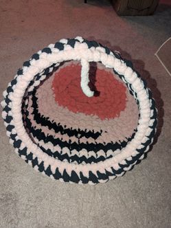 Multicolored handknitted cat cave