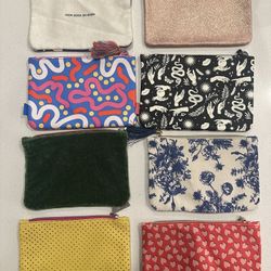 8 Ipsy Makeup Bags. 