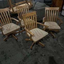 4 Rolling Chairs 