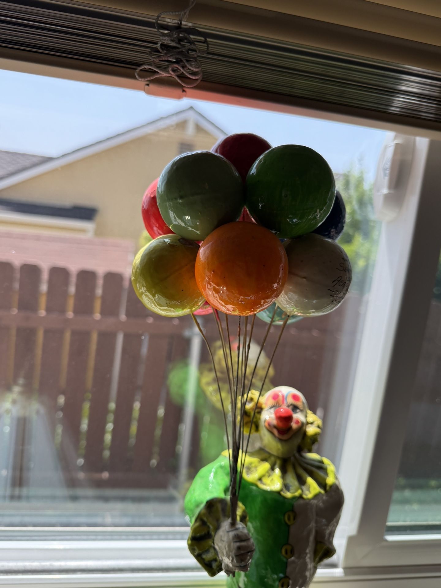 Hanging Clown And Standing Solo Clown With Balloons