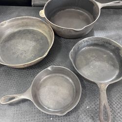 Cast iron Sklts w/ Antique Wagner Ware