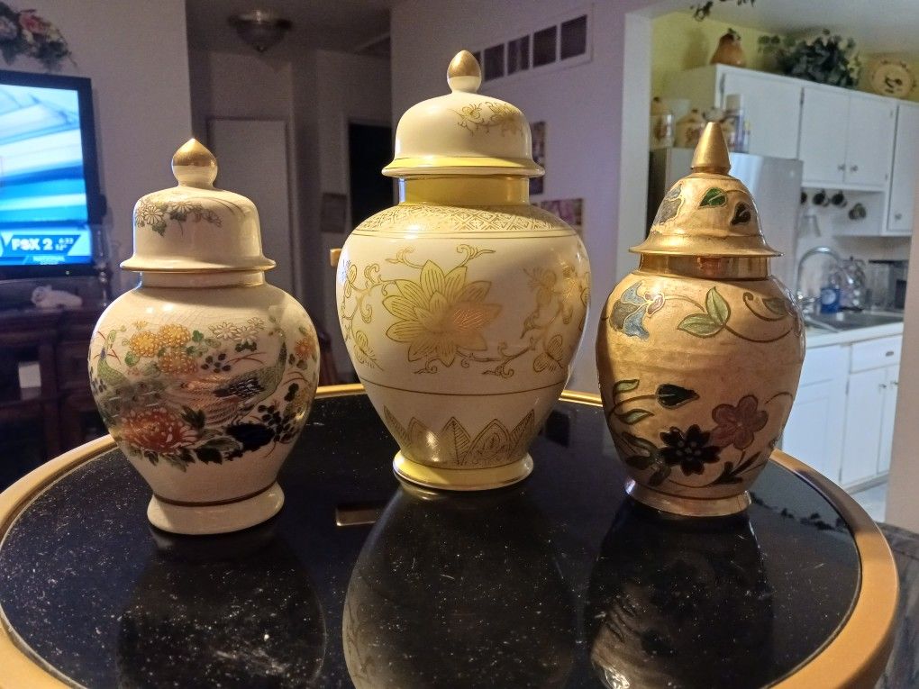  3 really, NEAT LOOKING  VASES  Or URN  7 TO 8,5 INCHES TALL  PERFECT CONDITION 