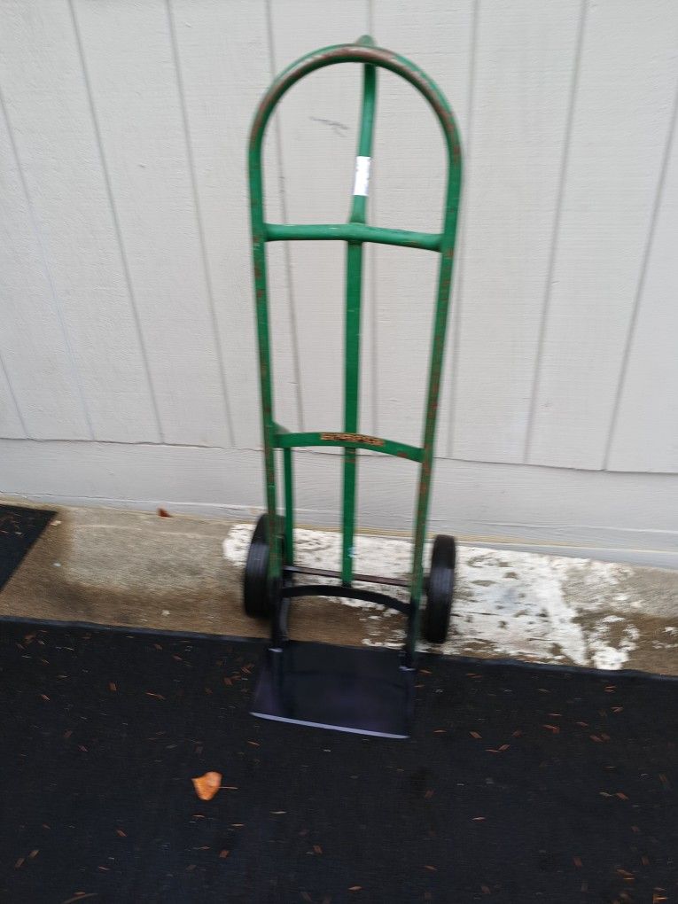 Dolly Heavy Duty , Non Inflatable Tires $ 45 Firm Price Good Condition