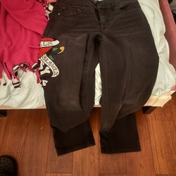 Ed hardy denim pants.