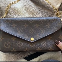 Louis Vuitton  Pochette $900