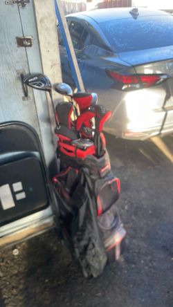DATREK golf bag and with the golf clubs
