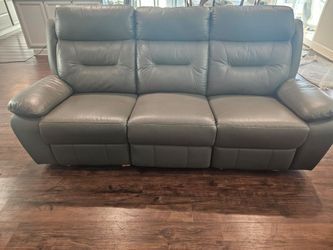 2 Leather Manual Reclining Sofas