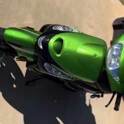 Moped,Green and black 2024 