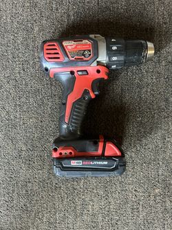 Milwaukee Hammer Drill w battery and charger