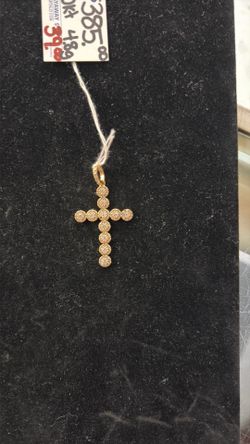 Cross missing one stone