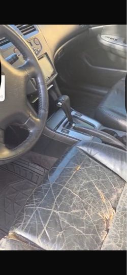 Car Interior with Worn Leather Seat