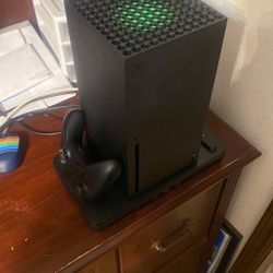 Xbox Series X. With Cords, Controller,  And The Vent That Lights Up At The Bottom.