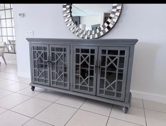 Rooms to go Grey Four-Door Glass Front credenza