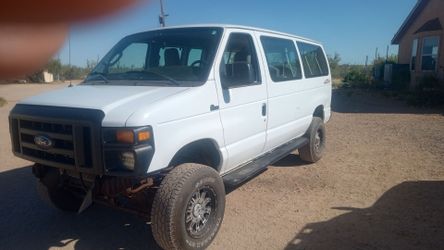 2012 Ford E350 4X4 Quigley van $15,000