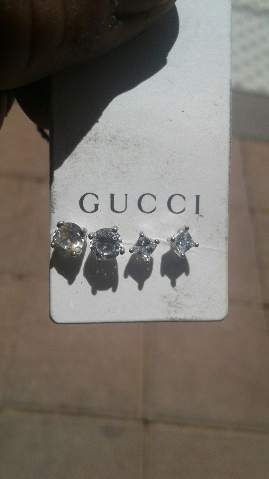 two pair of cz diamond earrings set in silvee made in italy they look 100%real both pairs $20