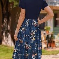 navy blue floral print midi dress featuring a black top, short sleeves, and a gathered waist