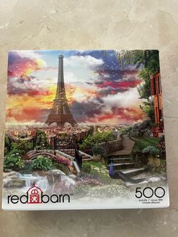 Bright and fun 500-piece puzzle featuring a vibrant seaside village with boats and colorful buildings. Great for a relaxing night in or a weekend proj