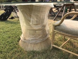 Glass topped dining table with 4 chairs