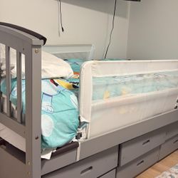 Child's bed; includes mattress and safety rail, Twin Bed