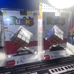 2 Rubiks Cubes Sealed . (circa. 2010)