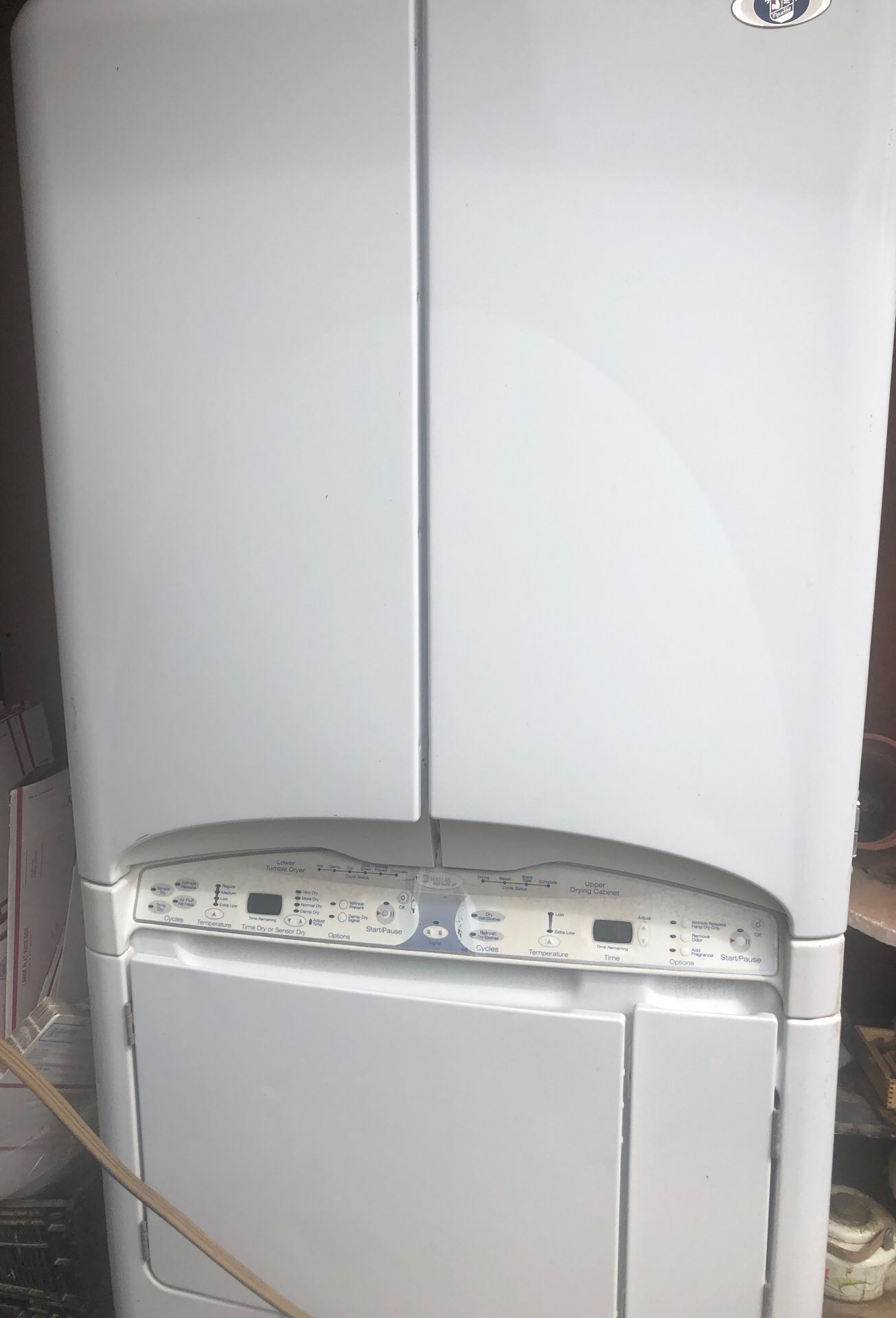 Maytag Neptune dc. Top is for dry cleaning , bottom regular dryer. Propane ready. Works great. 100