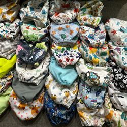 Cloth Diapers, Liners, Inserts, On The Go Bag, And Splash Guard