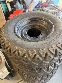 Polaris 12” wheels 25x9-12