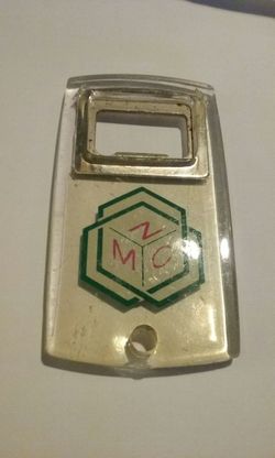 Vintage lucite bottle opener.
