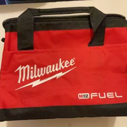 Brand New Milwaukee M12 Fuel Heavy Duty Tool Bag Canvas and Nylon Approximately 13x11x11.    20 Firm on Price.   20 Firme en Precio.