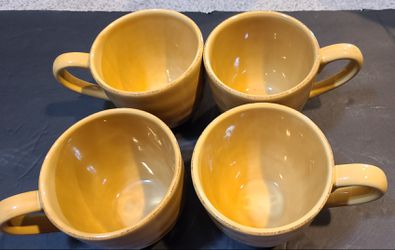 4 large 2 cup gold /mustard coffee cups