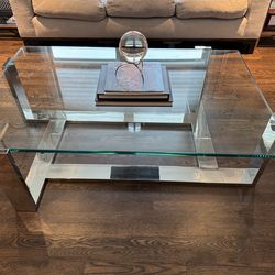 Glass coffee table with chrome legs