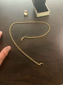 21K solid Figaro chain.