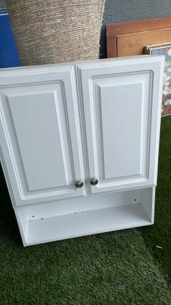 Wall cabinet for the restroom