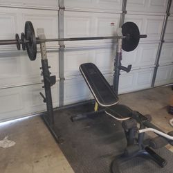 Olympic Weight Bench With Squat Rack Leg Developer curl bar & Olympic Weight set 140lbs read Description 