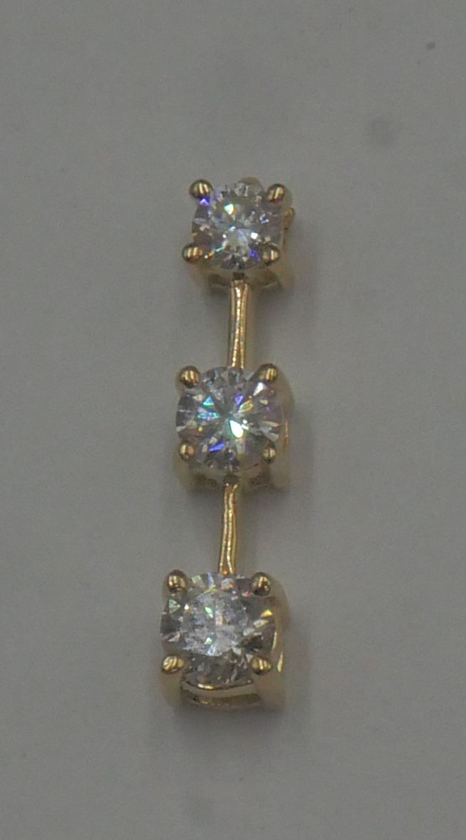 14kt yellow gold pendant 2 grams with 3 diamonds PAST PRESENT FUTURE. 1st diamond 4.7x3mm ; 2nd 4.4x2.7mm ; 3rd 3.8x2.4mm.886458-3.