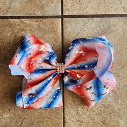 New. New without tags. JoJo Siwa Red, White and Blue Unicorn Bow
