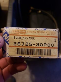 New old stock nissan 300zx fog light bulb