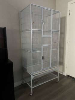 Large bird Cage 50 “ Tall 30” Wide 18” Deep On Wheels  $110. Pick up only.