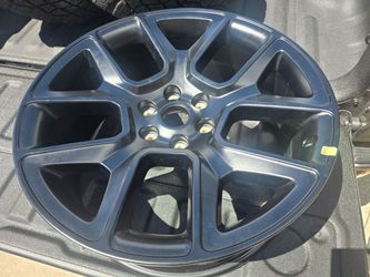 One new 22-inch Ram Laramie Night Edition  Rim