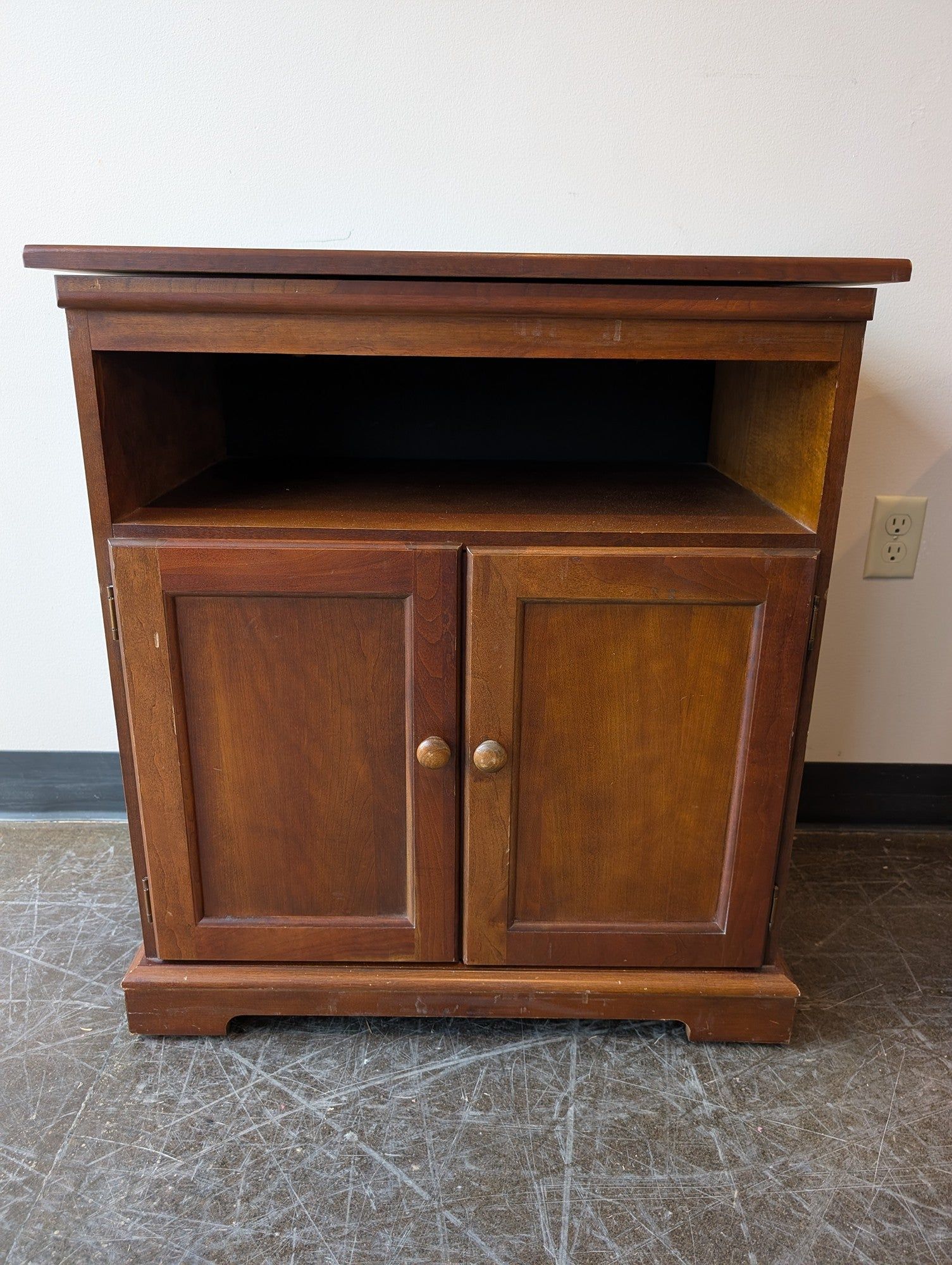 Compact Brown Wood Storage Cabinet with Spinning Top
