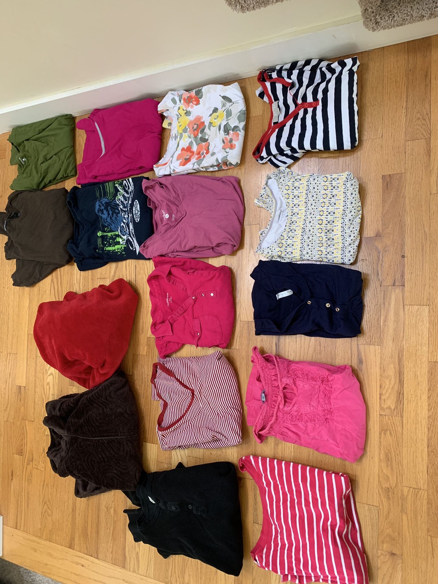 Pile of xl clothes, shirts and sweatshirts