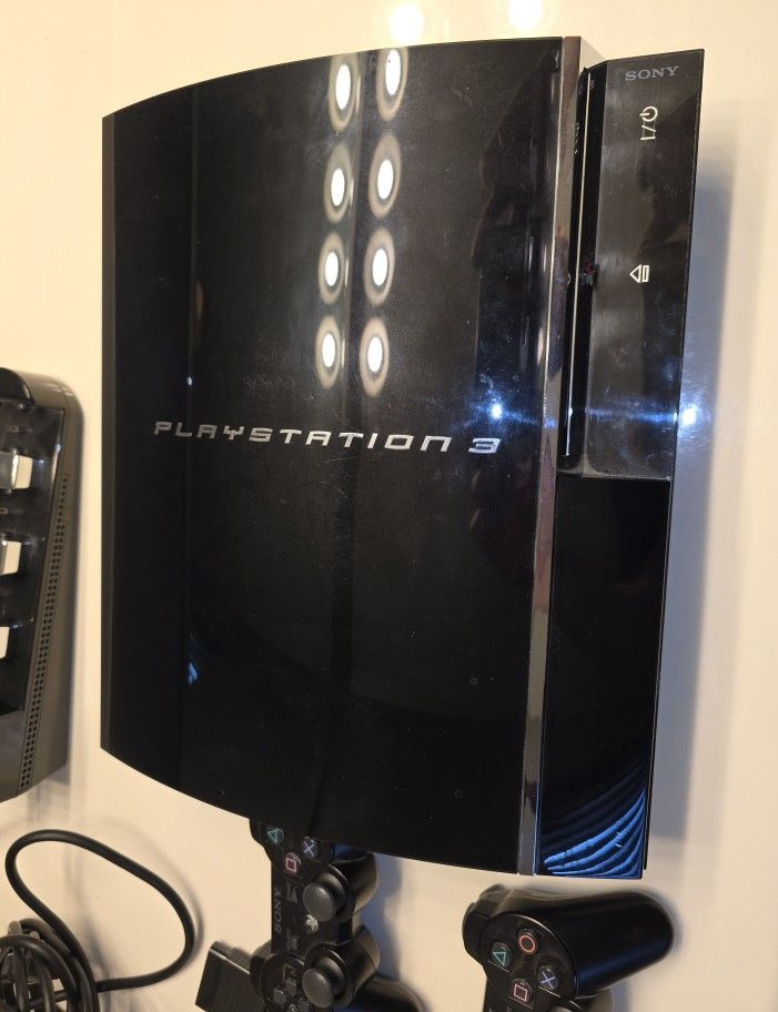 Original Sony PS3 with backwards compatibility with ps1 and ps2 games