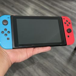 Nintendo Switch V1 Neon Red/Blue – Smash Bros Ultimate + Estuche + 2 Controles Pro + Vidrio Templado