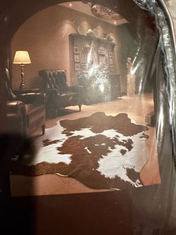 Brown and white Cow rug NEW (obolong)